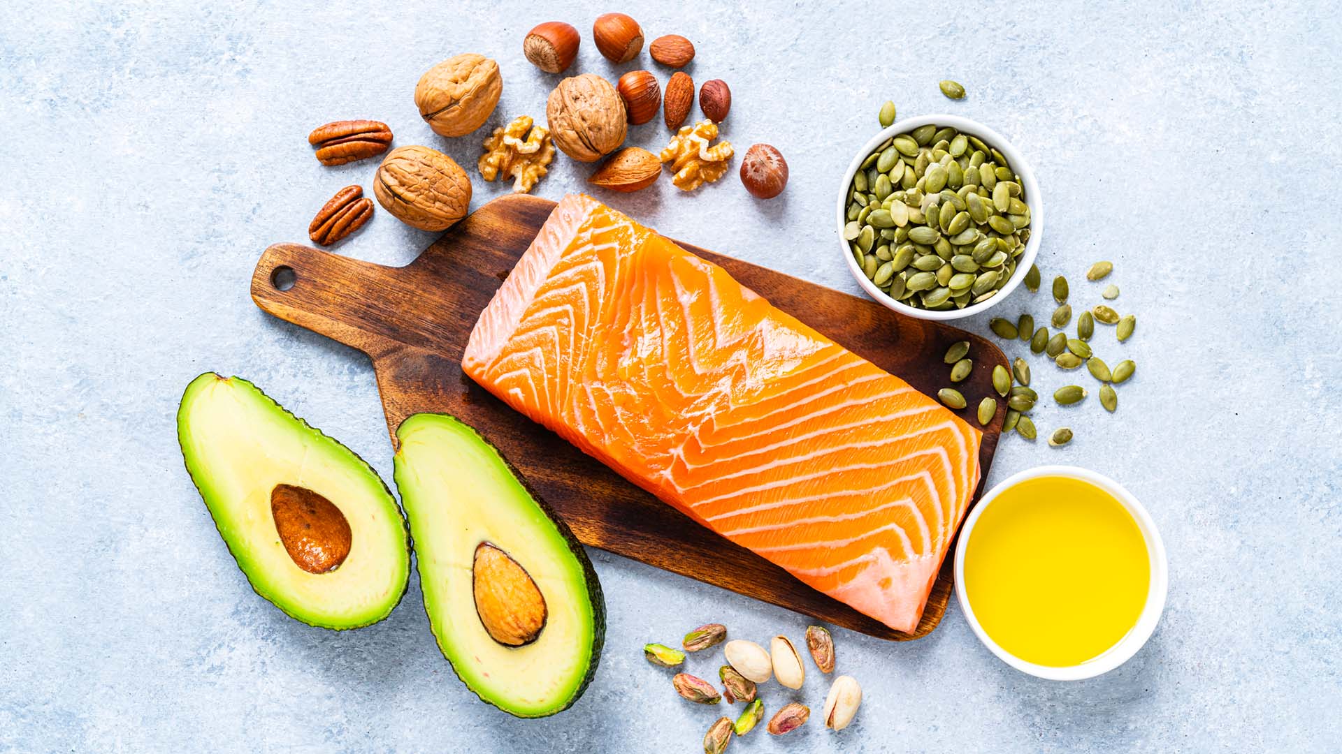 10 Practical Cholesterol Tips For SA Women Food with high content of healthy fats. Overhead view.