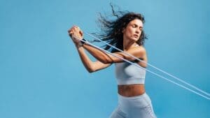 Woman doing stability workout using resistance band