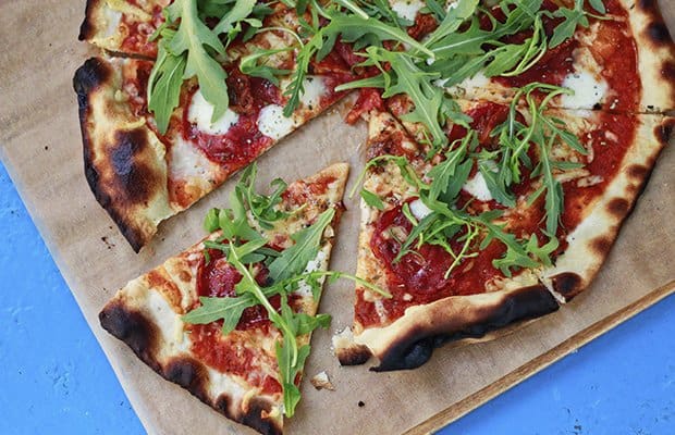 healthy pizza on a wooden board