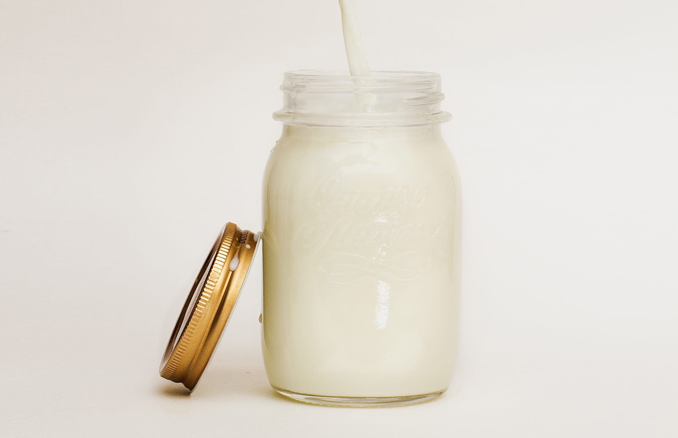 a jar of fresh coconut milk