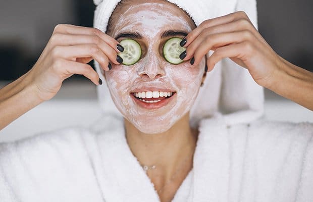 a woman with dry skin wearing a face mask