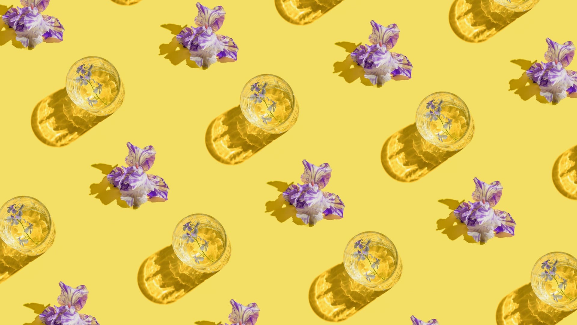 Signs of Binge-Drinking Among Women binge-drinking flatlay of drinks on yellow surface and purple flowers