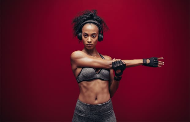 woman doing a hiit warm up