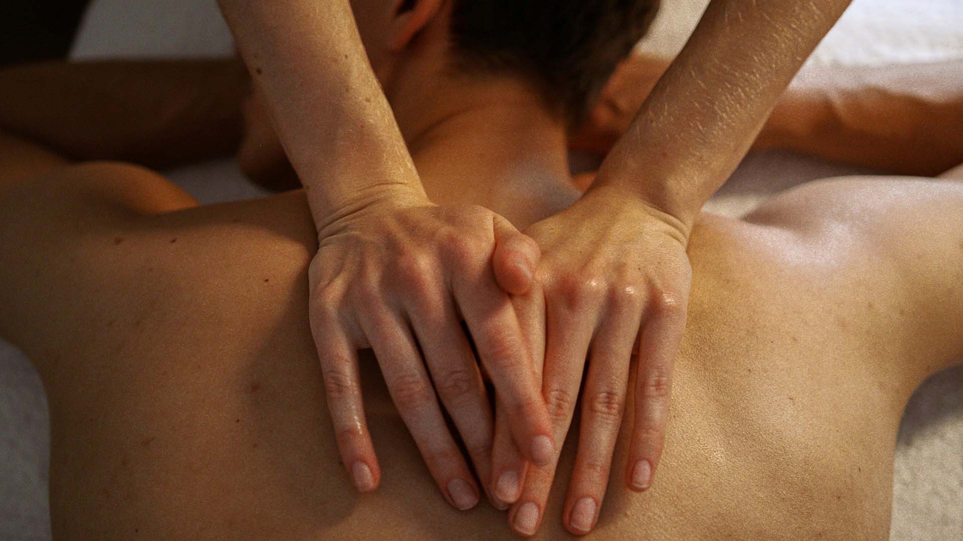 Woman giving a man a massage