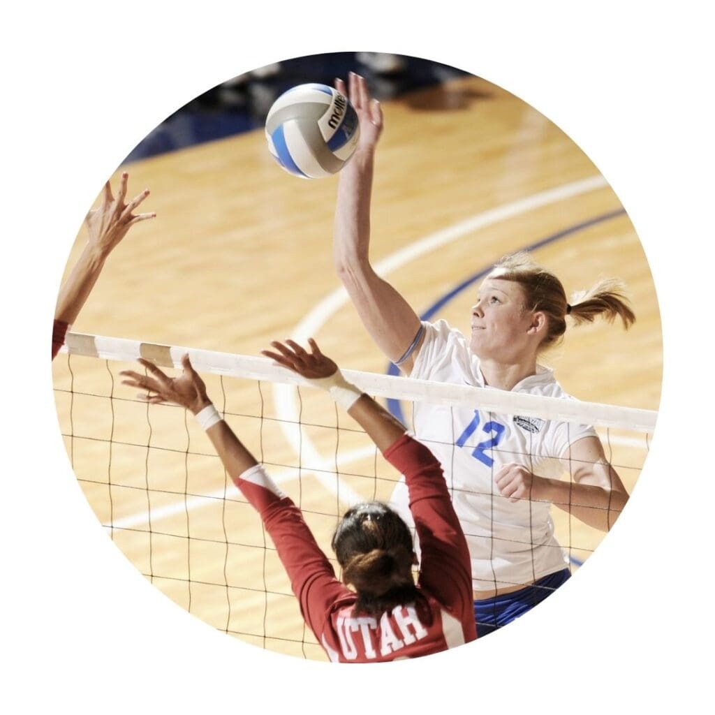 Women playing volleyball