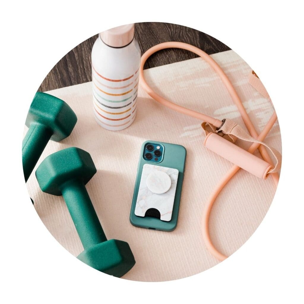 Skipping rope, dumbbells, water bottle and cellphone 