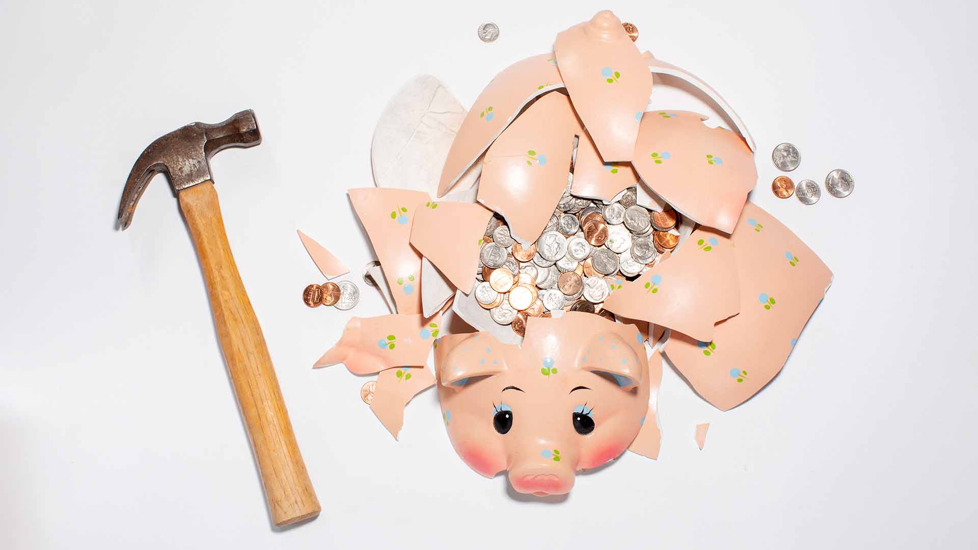 Piggy bank smashed with hammer