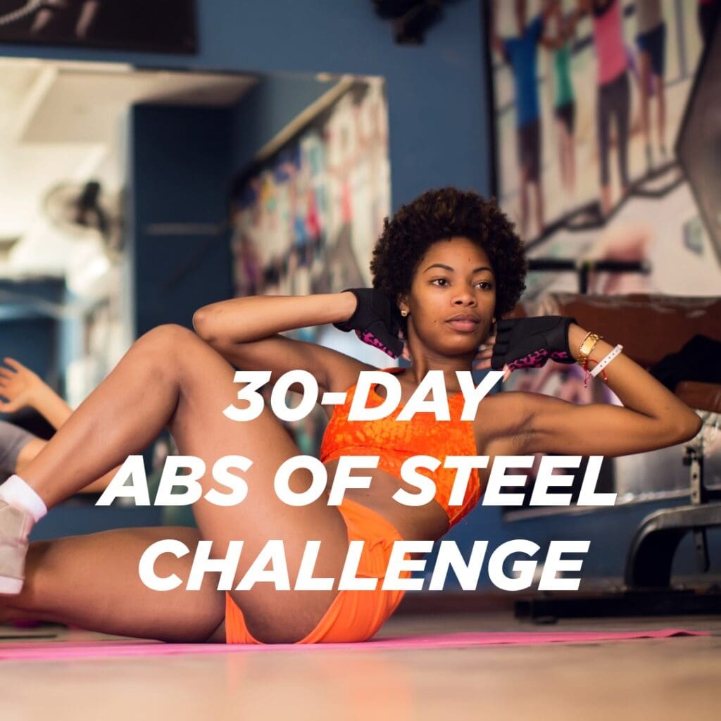 Woman doing bicycle crunches abs workout in orange gym outfit