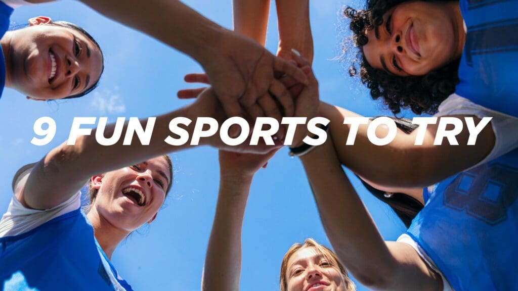 Women in fun sports in group high five