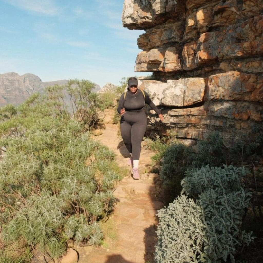 beginner runner Bubbles Zitumane running in the mountains