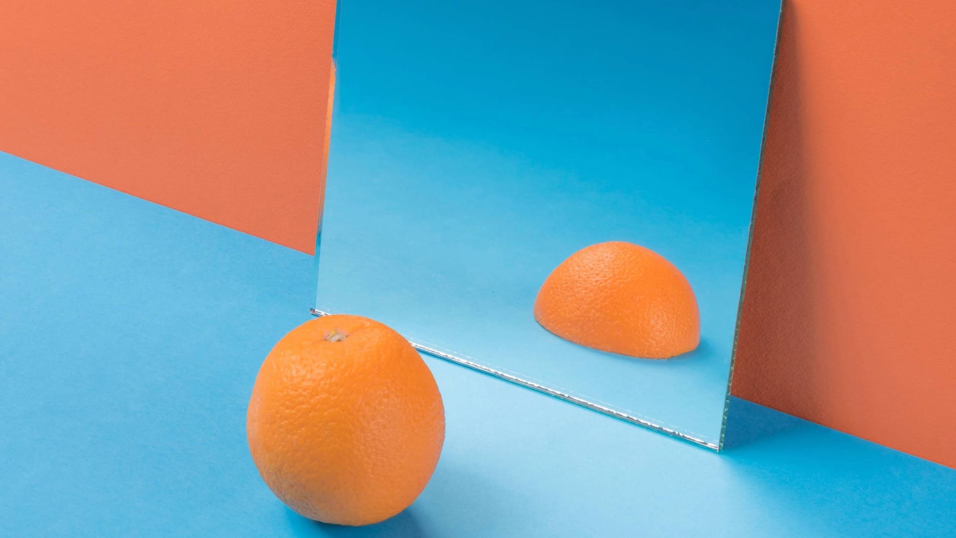 Orange facing mirror and seeing it is only half-cut, not good enough