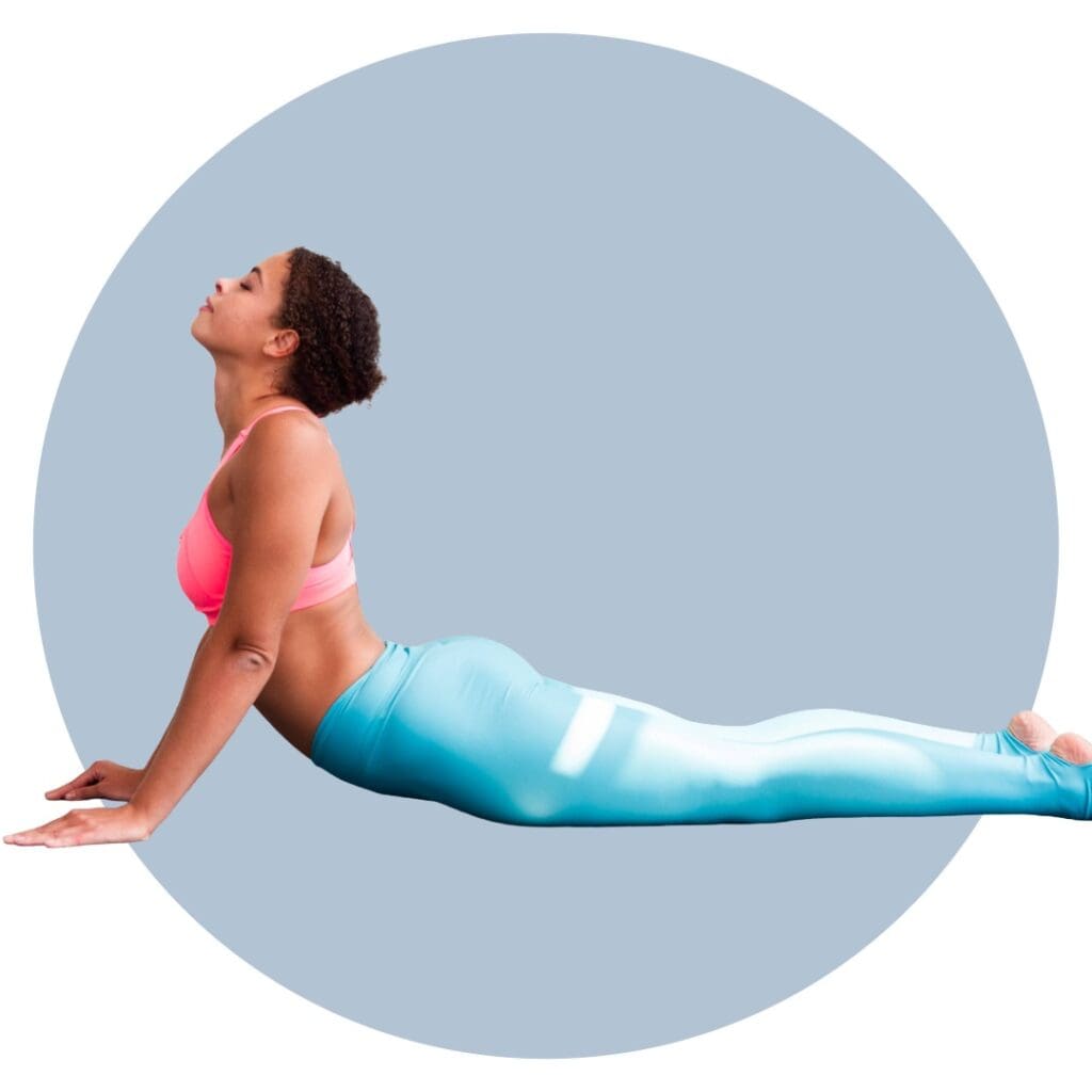 Woman doing Bhujangasana (Cobra pose) yoga poses to beat burnout